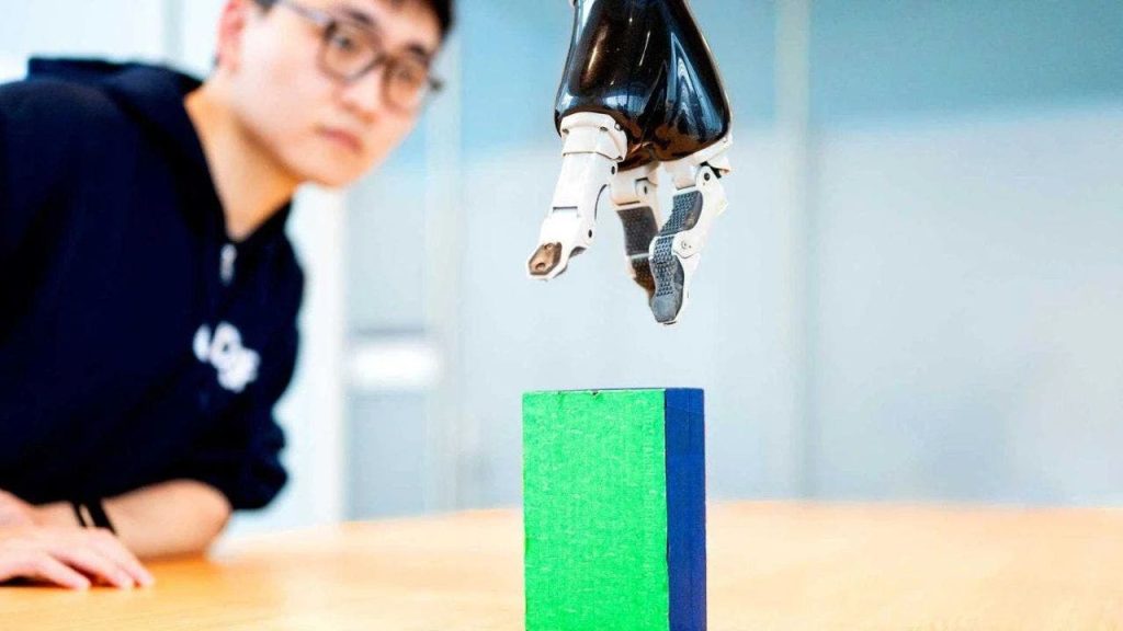 Paralyzed Man Uses Brain Signals to Control Robotic Arm with AI Technology