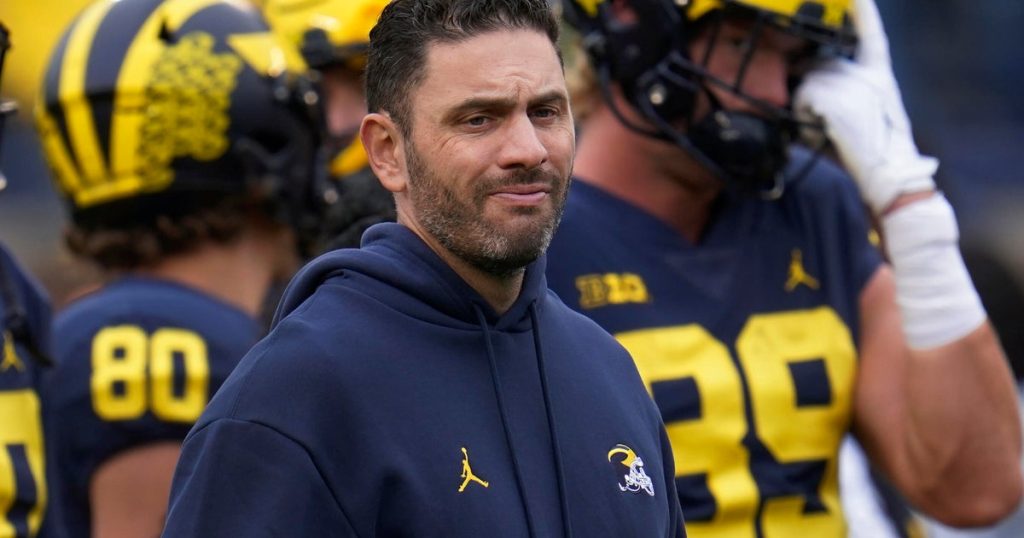 Former Michigan Quarterbacks Coach Charged with Identity Theft and Hacking