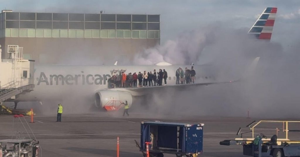 Passengers Evacuate After American Airlines Plane Catches Fire on Denver Airport Tarmac