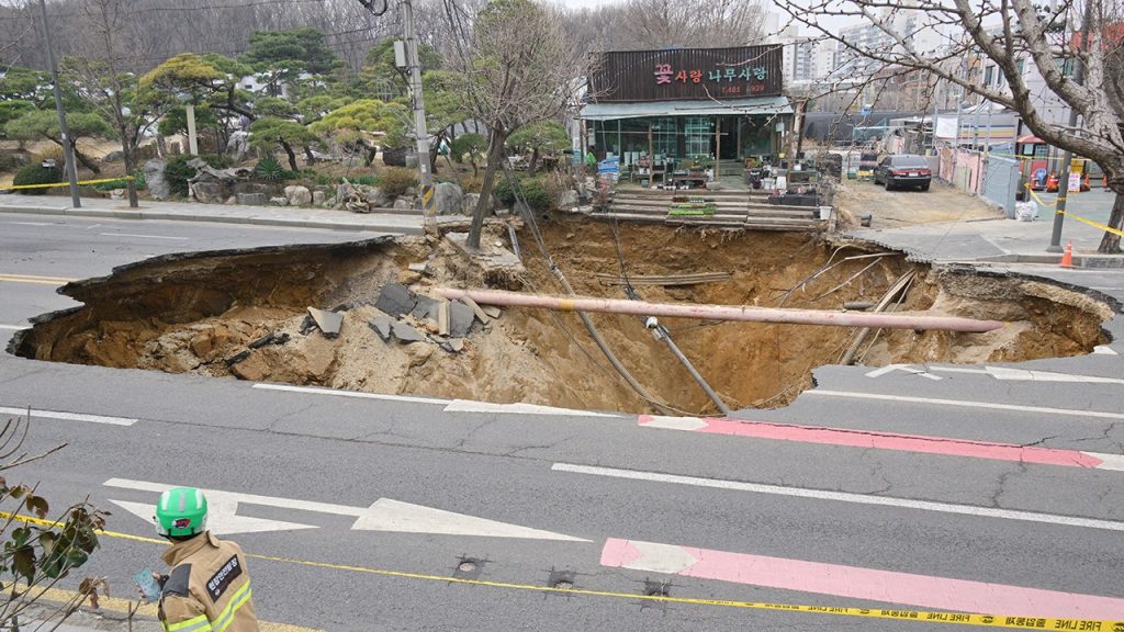 Motorcyclist Missing in Sinkhole Found Dead After Search Effort