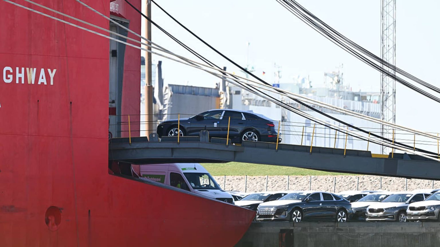 Auto Industry Responds to Tariffs with Price Increases and Job Cuts