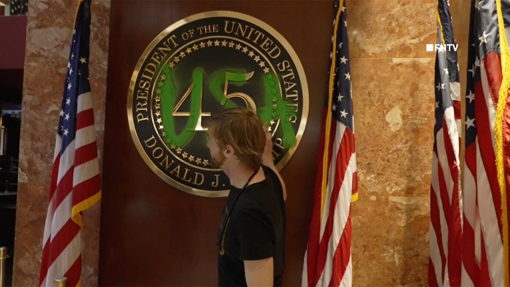 Climate Protester Vandalizes Presidential Plaque at Trump Tower