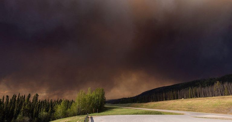 Tens of Thousands Evacuate as Canadian Wildfires Rage