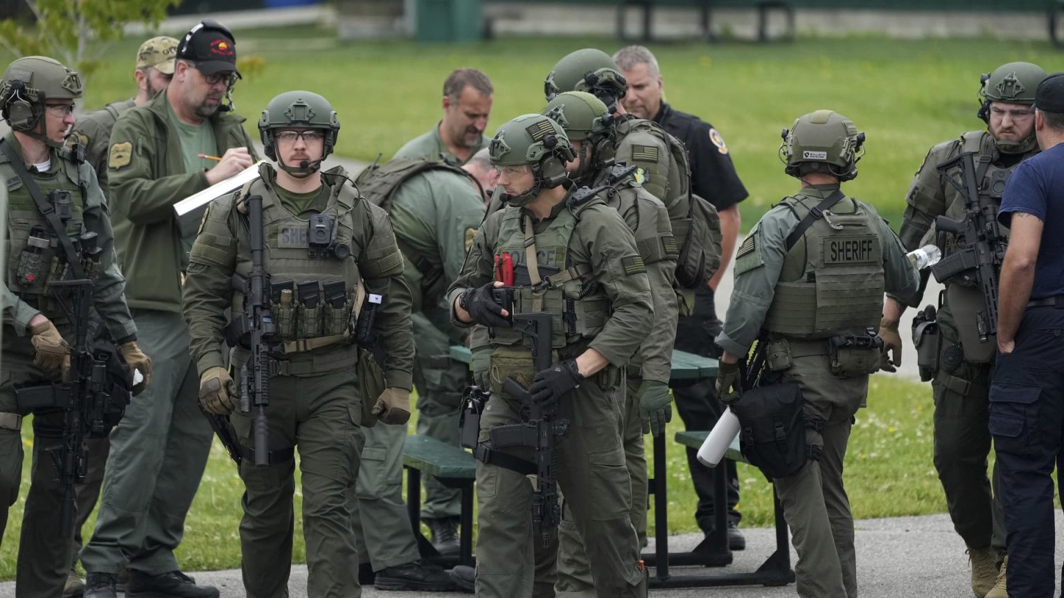 Manhunt for Minnesota Gunman Enters Second Day