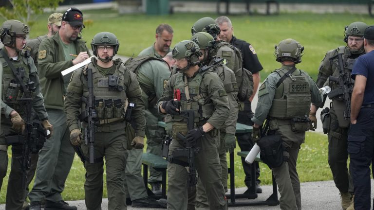 Manhunt for Minnesota Gunman Enters Second Day