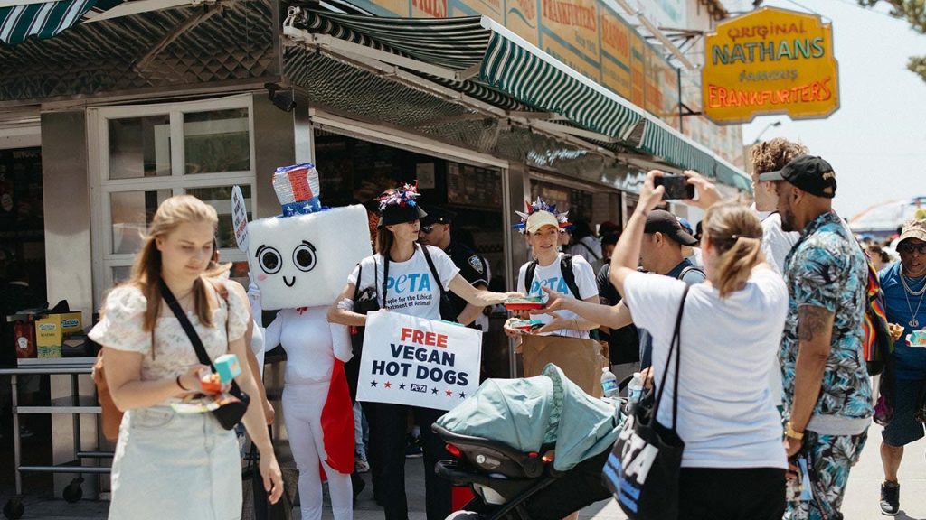 PETA Distributes Vegan Hot Dogs at Nathan's Hot Dog Eating Contest