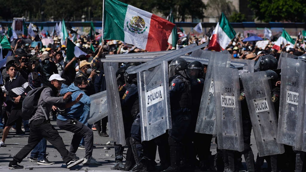Protesters Clash with Police in Violent Anti-Government March in Mexico City Protesters Clash with Police in Violent Anti-Government March in Mexico City