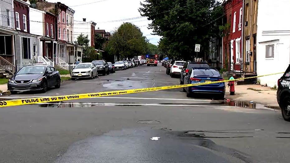 Three Dead and 18 Wounded in Separate Trenton and Chicago Shootings Three Dead and 18 Wounded in Separate Trenton and Chicago Shootings
