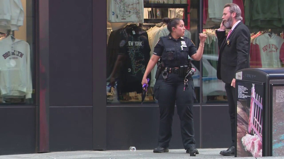 Woman Accused of Stabbing Two in Times Square Shot by NYPD Woman Accused of Stabbing Two in Times Square Shot by NYPD